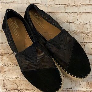 Black mesh and suede shoes